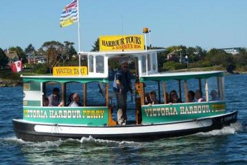 a group of people riding on the back of a boat