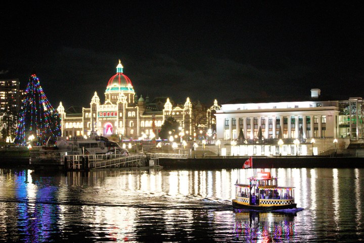 A harbour lit up with christmas lights